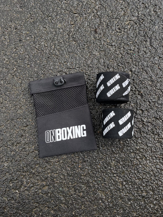 on boxing hand wraps black / white