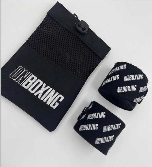 on boxing hand wraps black / white